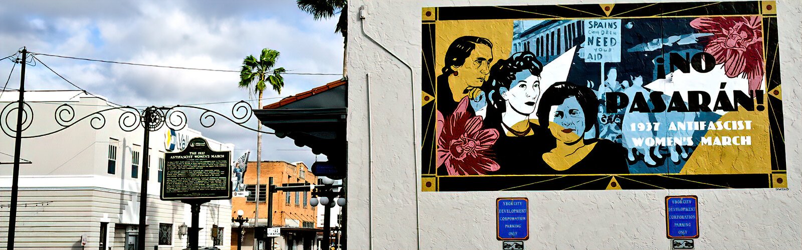 A historical marker and mural honor the 1937 Antifascist Women’s March when thousands led by women marched down Seventh Avenue to protest the rise of fascism in Spain.