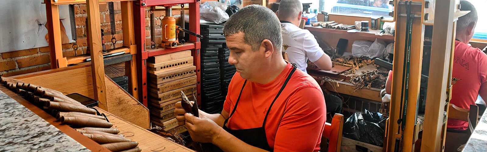  Once known as the cigar capital of the world, Ybor City has retained several shops where skilled cigar workers still hand-roll the tobacco leaves and make premium handcrafted cigars.