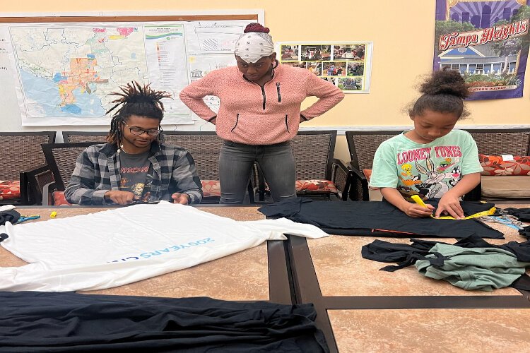 Local designers and creatives worked with children and teens at the Tampa Heights Junior Civic Association Community Center to create their own fashion designs for the first Tampa Connect Fashion Week.