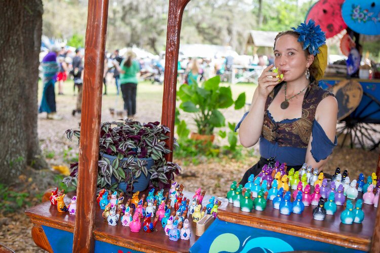 Linnea Anderson, 15, attends her first Bay Area Renaissance Festival,  selling her water-filled bird whistles. 