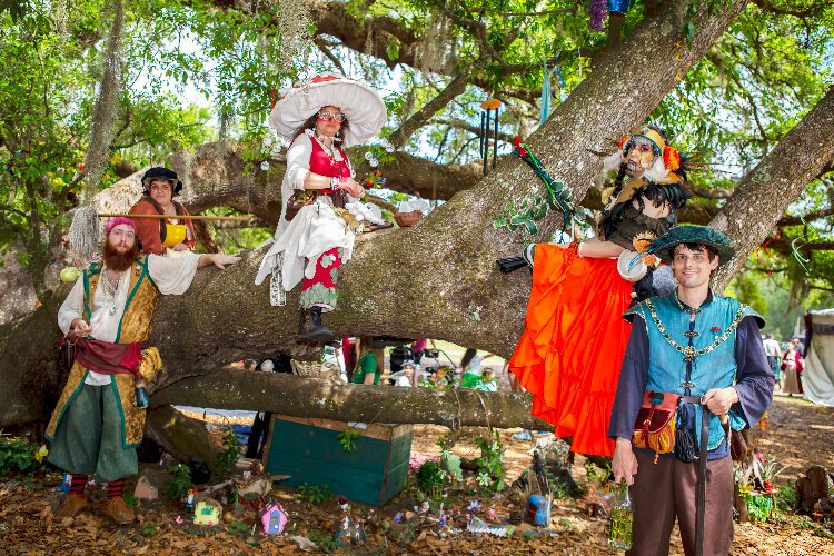 Nestled among the oak trees, performers interact with attendees during "Shamrocks & Shenanigans," week five of the Bay Area Renaissance Festival's themed weekends.