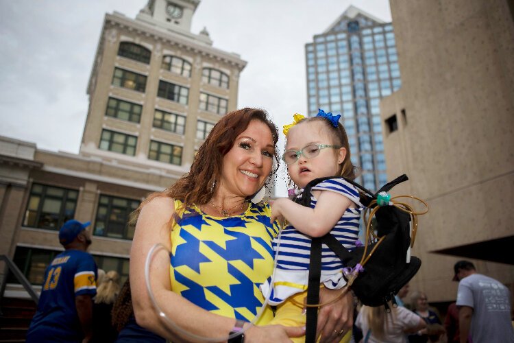 Marchelle Lamaster and daughter Olivia, 3, during the City of Tampa World Down Syndrome Day event.