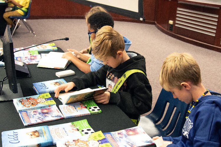 The Closing the Gap program's signature event in Pinellas County elementary schools is the annual Boys Read Book Battle.