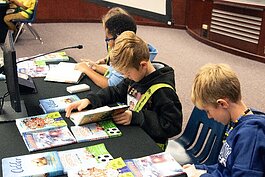 The Closing the Gap program's signature event in Pinellas County elementary schools is the annual Boys Read Book Battle.