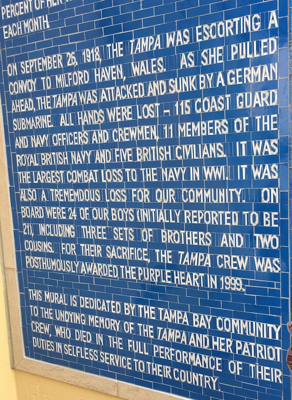 Glass mural tells the history of USS Tampa.