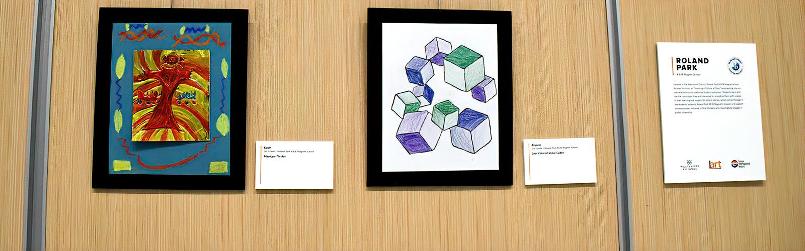 “Mexican Tin Art” by 5th grader Kash and “Cool Colored Value Cubes” by 2nd grader Alyson are some of the artwork by Roland Park K-8 students on display. 