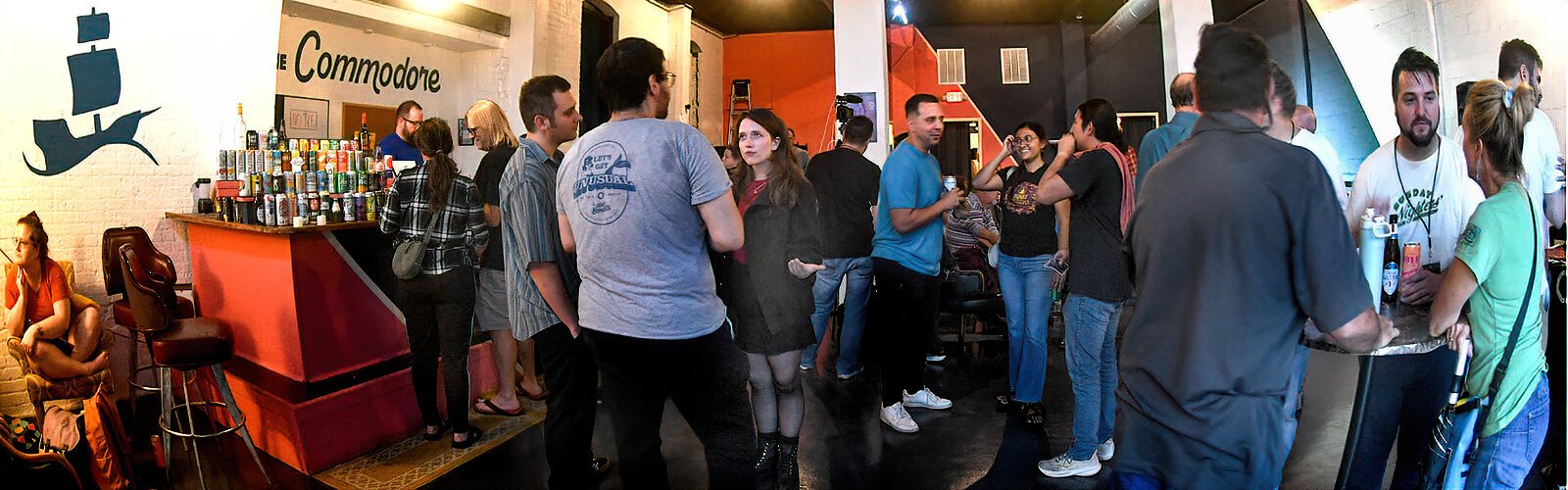 Improv performers and audience members mingle during an intermission on the final day of the 2025 Countdown Improv Festival