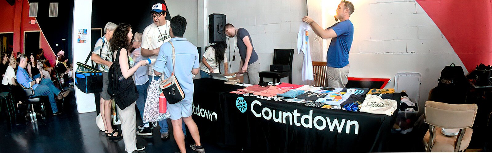 The merch table is stocked with T-shirts on the final day of the Countdown Improv Festival