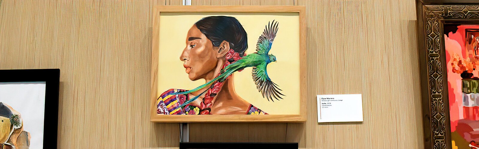 “Ioche”, a colored pencil artwork by Elyse Marrero of Hillsborough Community College, is showcased in “Celebrating Student Creativity.” 