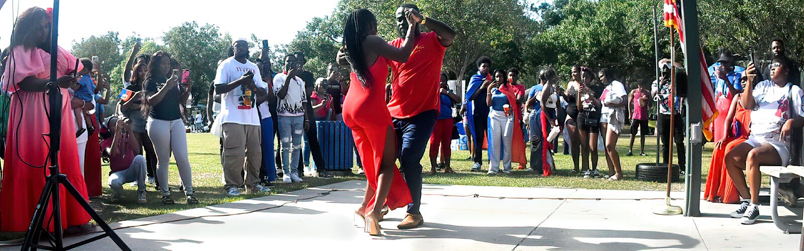 Dancing to vibrant Haitian rhythms, Caleb Exantus and Ruthy Dorilus celebrate Haiti’s Flag Day with gusto.