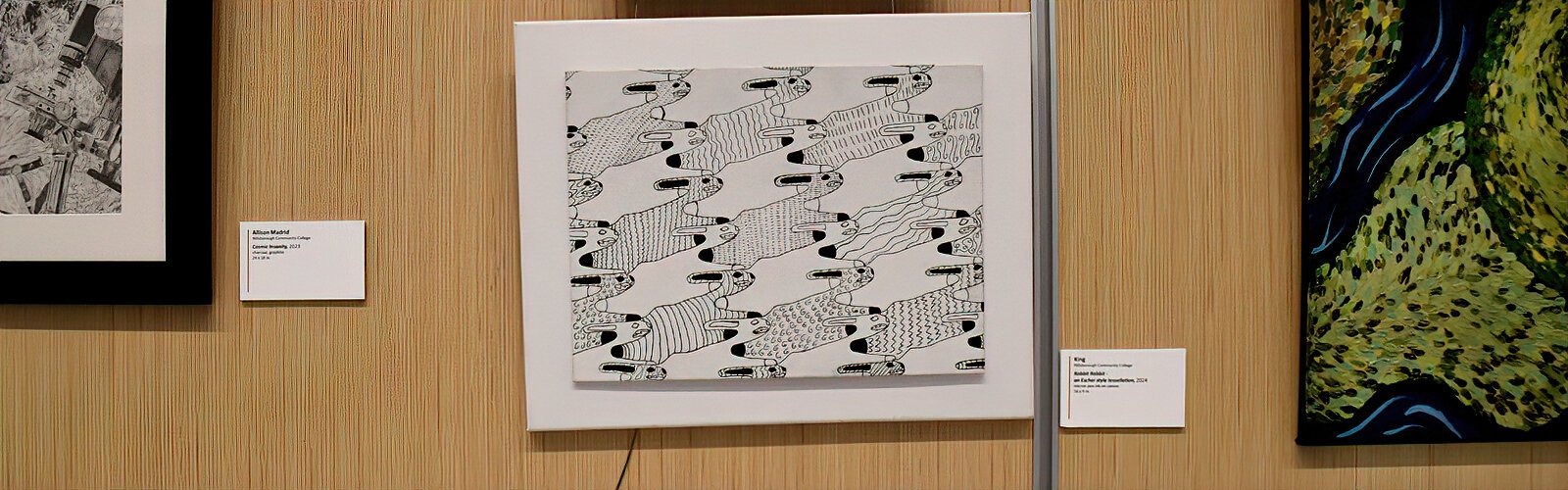  A micron pen ink on canvas, “Rabbit, rabbit, an Escher style tessellation” was created by King of Hillsborough Community College.