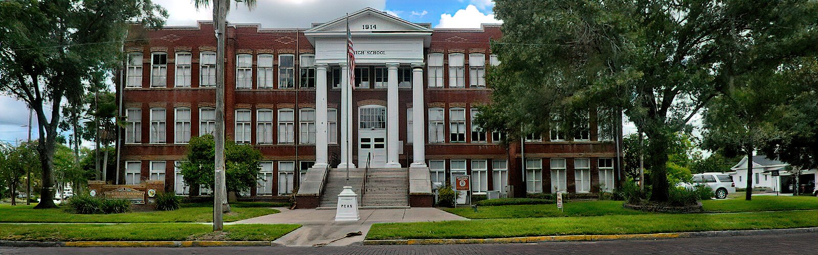 The historic 1914 Plant City High School Community Center was a school until 1972. Today, the brick Greek Revival building is the office of the East Hillsborough Historical Society.
