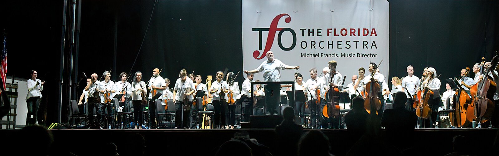 Retiring after 40 years, TFO’s principal timpanist John Bannon takes a bow after a patriotic finale that ends the Pops in the Park concert at River Tower Park.