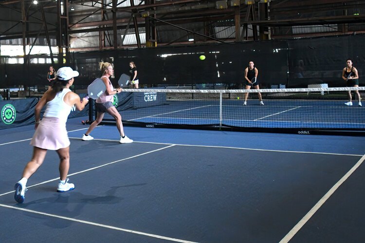 Pickleball, if you’re unfamiliar, is the paddle game similar to tennis and table tennis, but played on a badminton doubles court.
