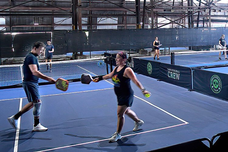 There are lots of laughs and lots of high-fives on the courts at Tampa Pickleball Crew.