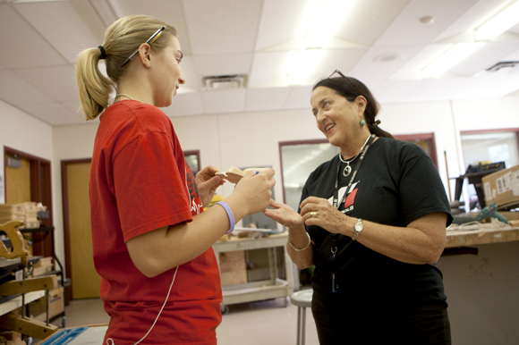 Aly Cote and team leader Margi Nanney discuss project details. - Julie Branaman