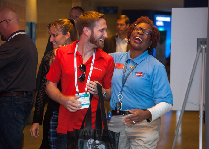 Attendees share a moment at the two-day Synapse Summit.