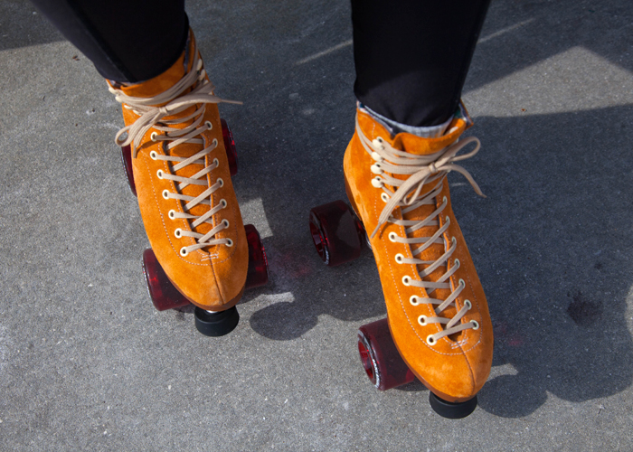 A woman roller skates at 11.6 acre Vinoy Park along the water in St. Pete.