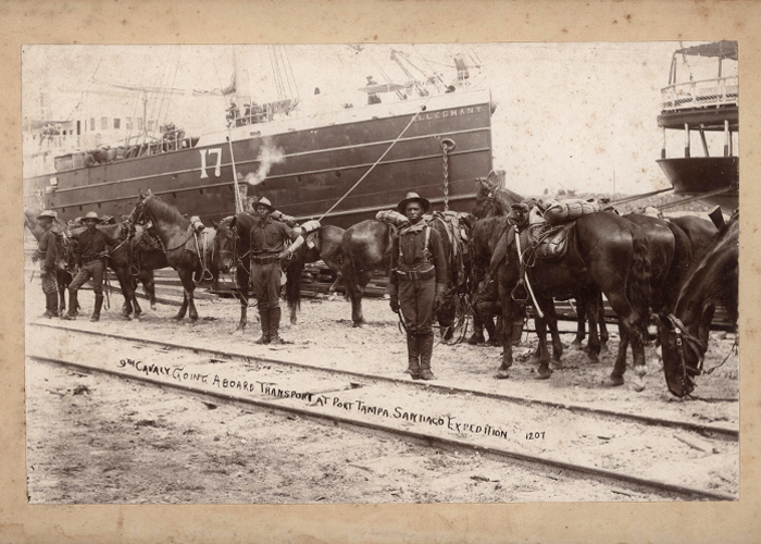 The ninth calvary boarding transport at Port Tampa during the Spanish American War.