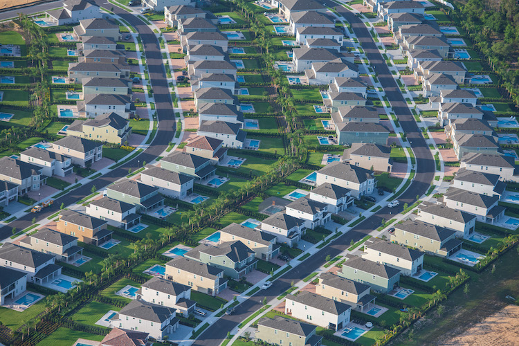 A sea of newly built homes adjacent to where Reedy Creek crosses Interstate 4.