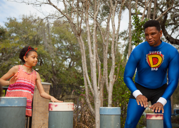 Aubree Vernon and her dad Maurice of JTEP Charity (which helps families buy diapers, supports positivity in fathering, and co-parenting) play at Macfarlane Park where Maurice played as a kid.