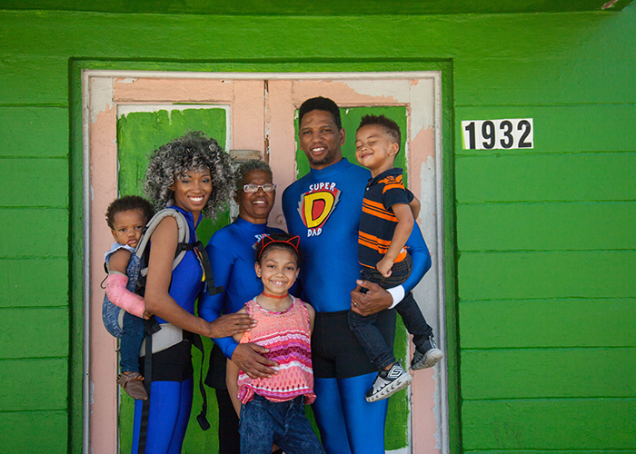 Founders of JTEP at their future headquarters in West Tampa, where the family needs to raise $20k for building repairs before opening. 