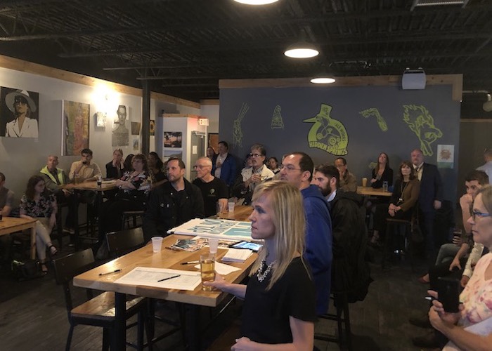 Residents and business owners discuss forming a business association at Urbanism on Tap.