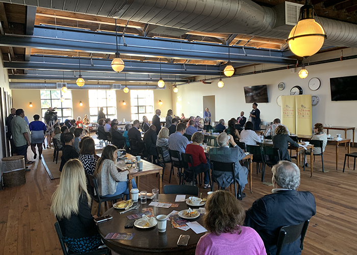 Tamara Shamburger answers questions from the crowd at Café Con Tampa.