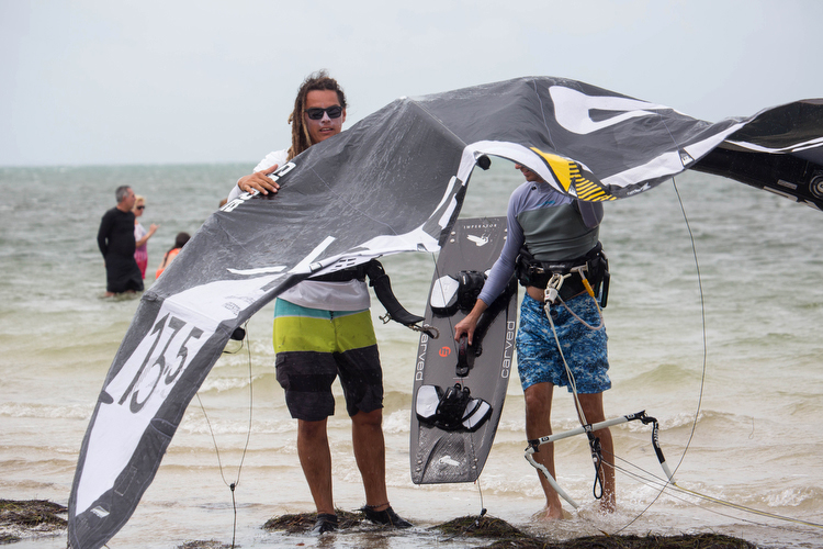 Kevin Castillo, a lead instructor with Elite Watersports, helps out fellow kiteboarders.