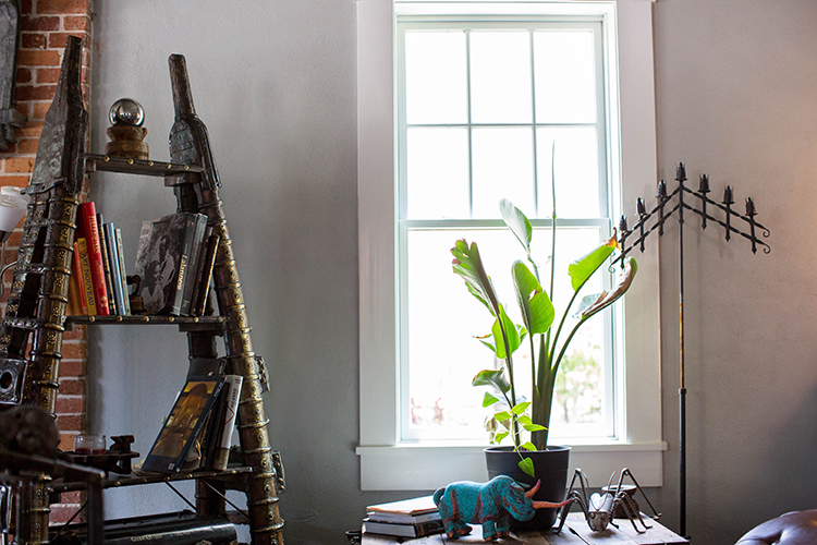 Antique decor includes shelves made from vintage ox carts.