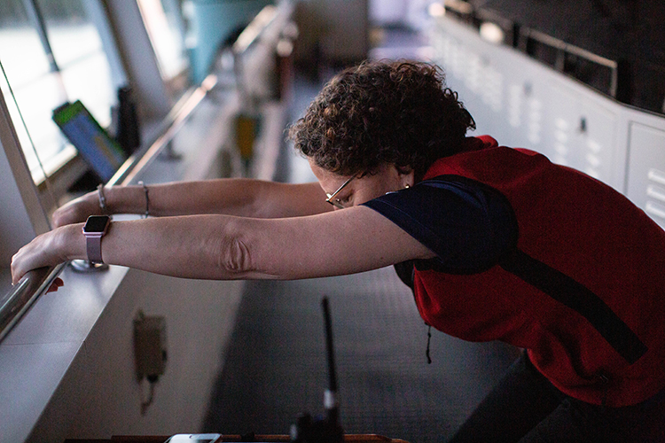 Harbor Pilot Carolyn Kurtz of Tampa stretches at dawn after an early morning shift that started at 2:30 a.m.