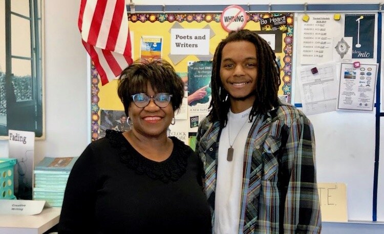 Poetry Out Loud winner Zhaedyn Hodge Sigars and his mentor, Blake High School's Casey Curry of Tampa.