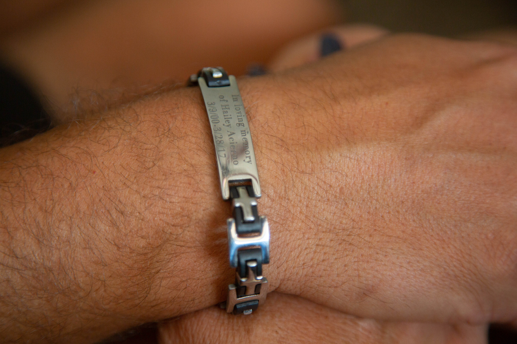 Chris Acierno wears a bracelet in memory of his daughter.