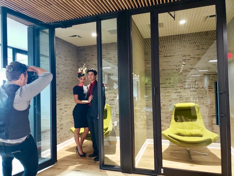 Lina Teixeira's daughter and son, Bianca and Lucas Persechino, pose in the The Ring's phone room during grand opening party.