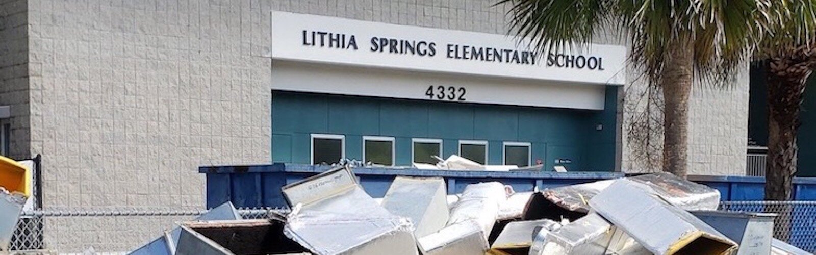 Construction debris piles up outside Lithia Springs Elementary in Valrico in East Hillsborough County.