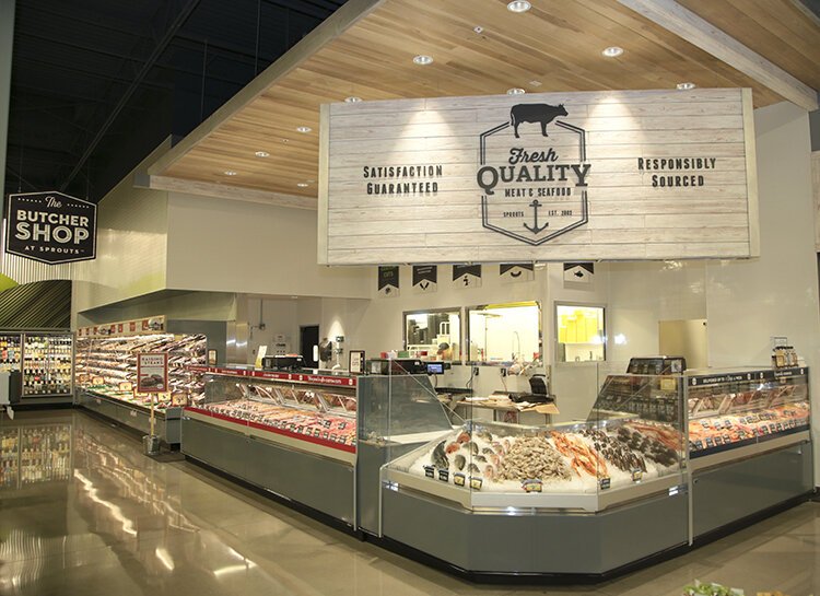 Interior design showcasing fresh meats and produce contributes to success.