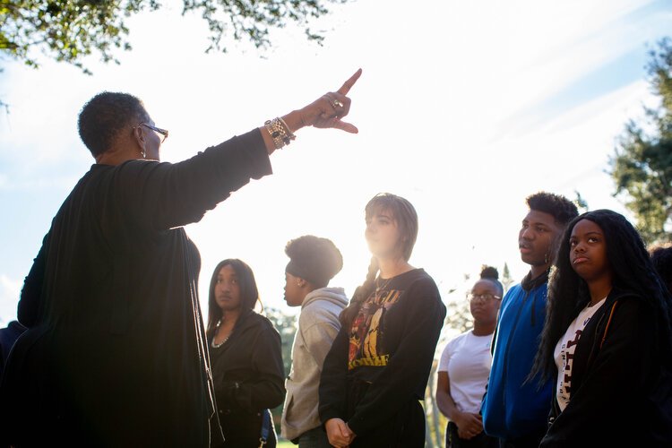 Gwendolyn Reese gives students a guided tour with inspirational words to youth of Pinellas County. “We can not let our stories die,” Reese said.