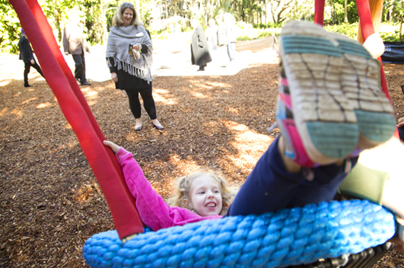 As soon as the ribbon was cut kids bounded onto the playground. - Julie Branaman