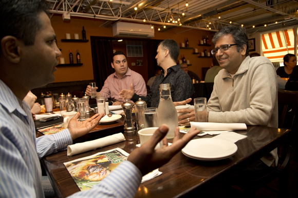 Pat Bhava and Ramesh Sambasivan chat during Bootstrappers Breakfast. - Julie Branaman