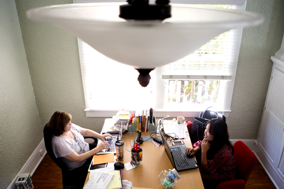 Virginia Barnett and Phuong Cotey are hard at work at Gr8Code. 