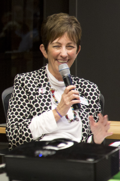 Johnette Isham, founding director of Realize Bradenton, answers questions during the NYAS event at the Iron Yard in St Pete. 