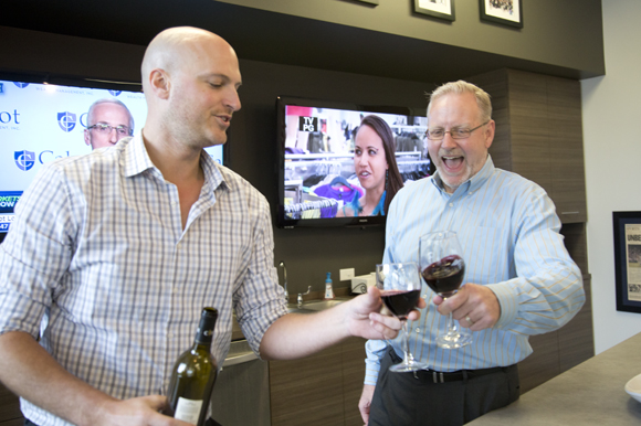 VACO partner Jim Parker and Chris Nelson celebrate Wind Down Friday.  