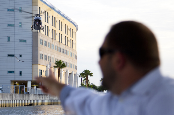 The TGH helicopter lands at the hospital. 