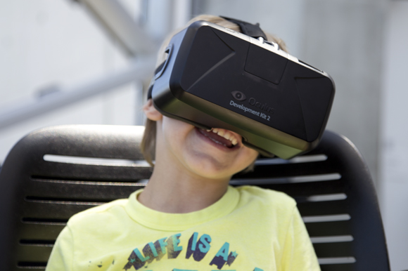 Malcolm Curry reacts while participating in a Oculus Rift Virtual Reality Demo during Project34 Hackathon at The Dali. 