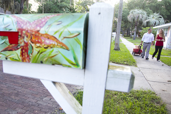 The Hurak family goes for a walk in their Safety Harbor community.