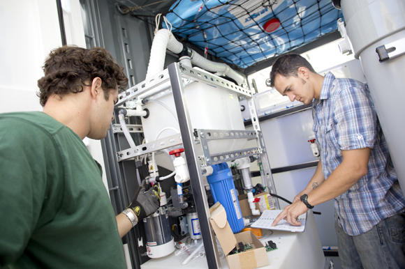 USF Graduate Research Assistant Robert Bair works on the NEWgenerator.