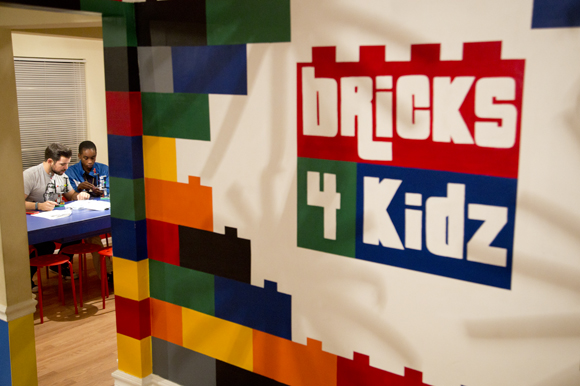 Big Brother John Fontana and little brother Isaiah Hopkins build a Star Wars Fighter at Bricks 4 Kidz in Tampa. 