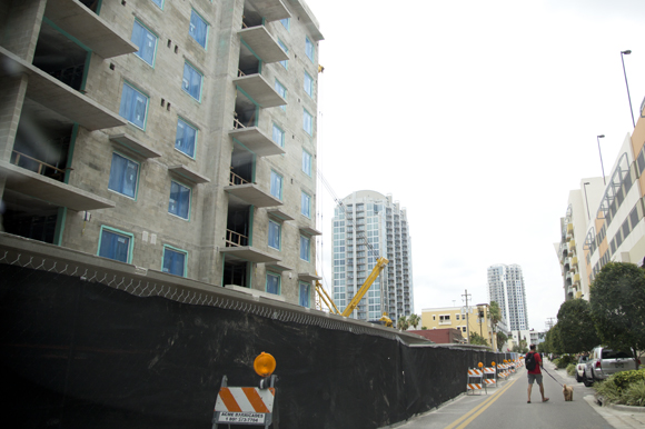 Walking the dog near construction of the The Fitzgerald.
