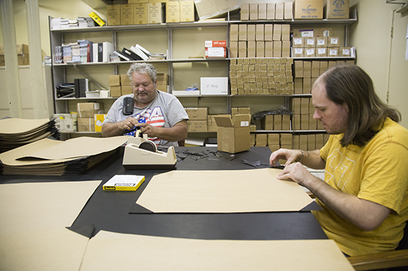 Scott Adams and Aaron Palermo work at the Louise Graham Regeneration Center. 