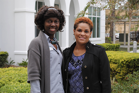 Claudia Gunns with Metropolitan Ministries, left, and Latisha Lomax.